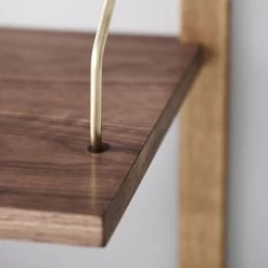 Royal System Regal 5 (Konfigurationsbeispiel) -Möbel & Dekoration dk3 Royal System Walnut and Oak oil Close up Brass Rails Styled 1280x1280